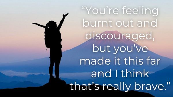 Woman wearing a backpack standing in front of a mountain with her arms raised with quote, "You’re feeling burnt out and discouraged but you’ve made it this far and I think that’s really brave.”