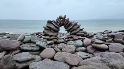 Dauntless Anxiety Counseling - Failure to Launch - Image of an small arch of stones on a stony beach